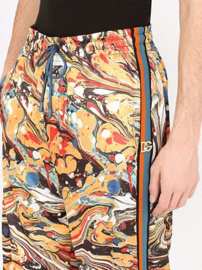 Shop Dolce & Gabbana Marble-print Satin Track Pants In Orange
