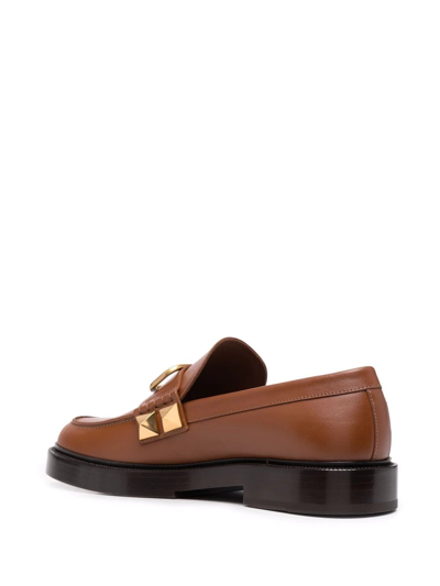 Shop Valentino Stud Sign Leather Loafers In Brown