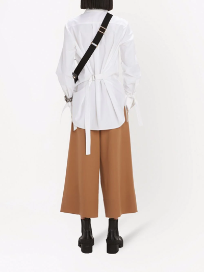 Shop Jw Anderson Pleat-front Wide-leg Cropped Trousers In Brown