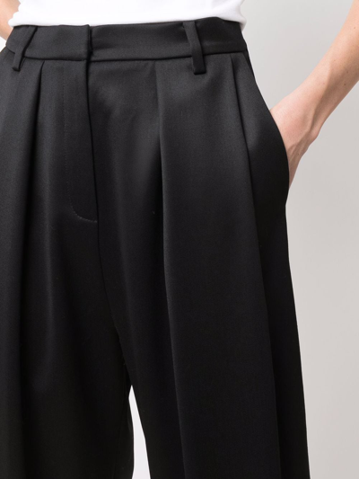 Shop Magda Butrym High-waisted Oversize Tapered Trousers In Black