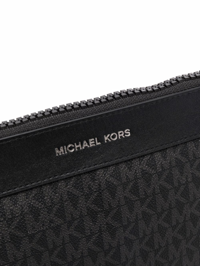 Shop Michael Kors Monogram Logo Travel Pouch In Black