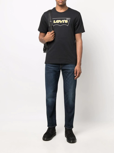 Shop Levi's 502™ Tapered-leg Jeans In Blue