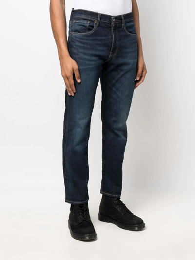 Shop Levi's 502™ Tapered-leg Jeans In Blue