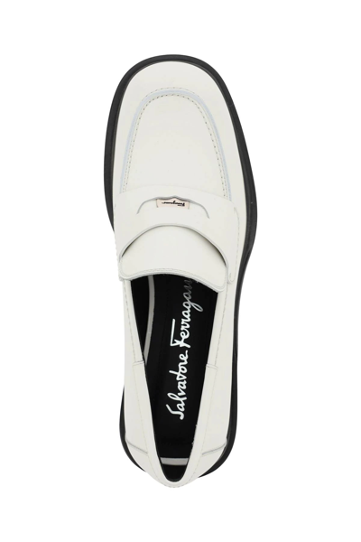 Shop Ferragamo Penny Loafers In White