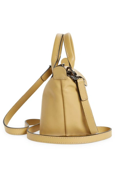 Shop Longchamp Mini Le Pliage Cuir Leather Top Handle Bag In Desert