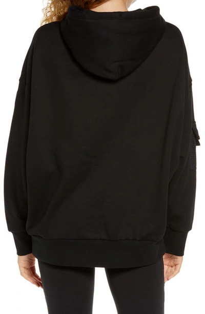 Shop Alo Yoga At Ease Hooded Sweatshirt In Black