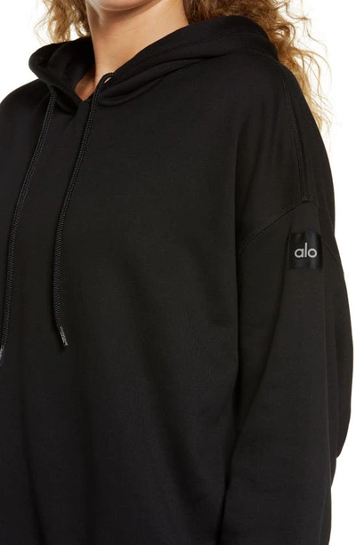 Shop Alo Yoga At Ease Hooded Sweatshirt In Black