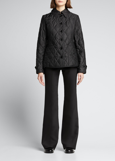 Burberry Embroidered Logo Quilted Jacket In Black