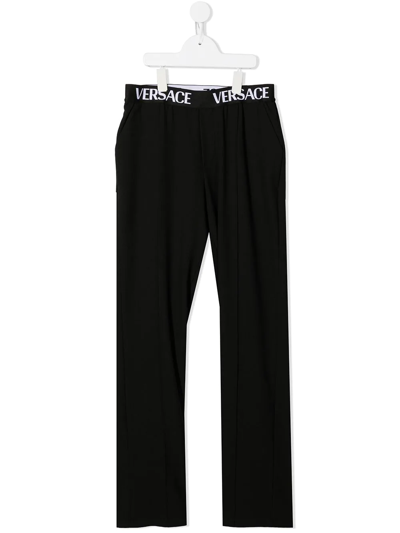 Shop Versace Logo-waistband Straight Trousers In Black