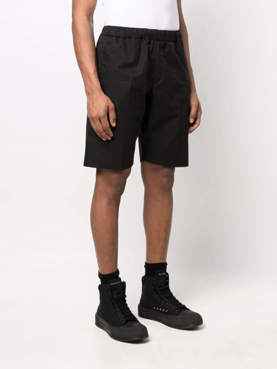 Shop Alexander Mcqueen Cotton Bermuda Shorts In Black