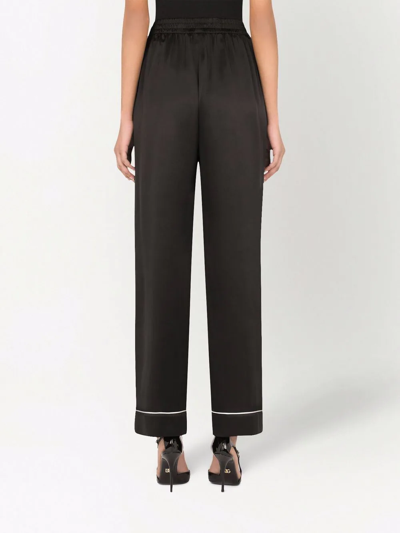 Shop Dolce & Gabbana Contrast-trim Satin Pajama Bottoms In Black