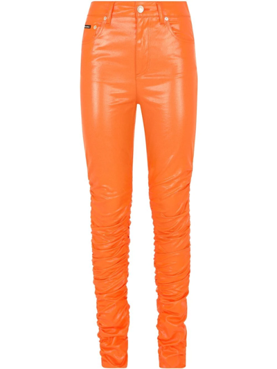 Shop Dolce & Gabbana Coated Cotton Pants In Orange