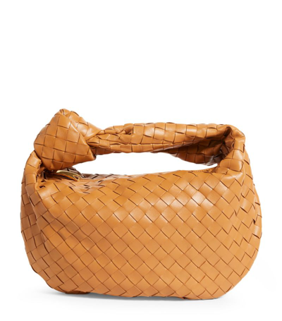 Shop Bottega Veneta Teen Leather Jodie Bag In Neutral