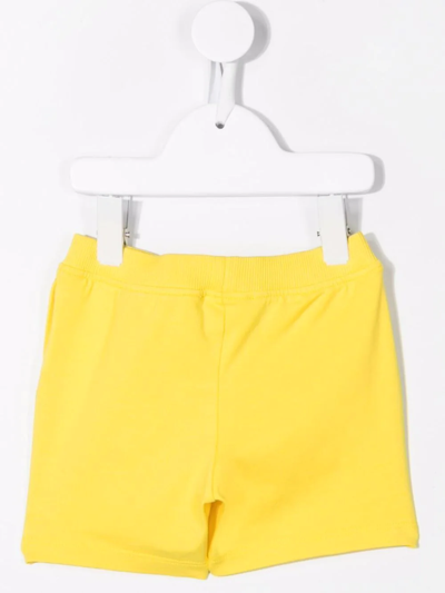 Shop Moschino Logo-print Shorts In Yellow