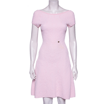 Buy designer Dresses by chanel at The Luxury Closet.