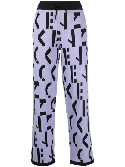 Shop Kenzo All-over Logo-print Trousers In Violett