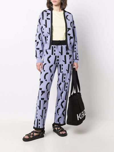 Kenzo All-over Logo-print Trousers In Violett