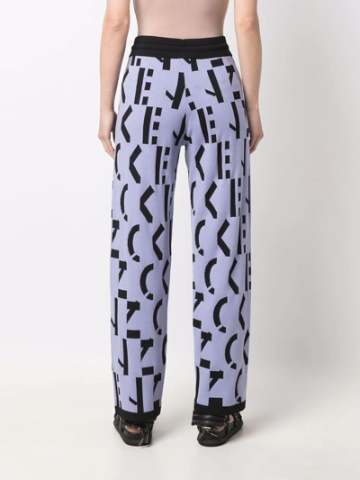 Shop Kenzo All-over Logo-print Trousers In Violett