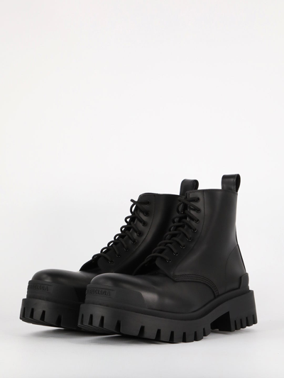 Shop Balenciaga Strike Lace-up Booties In Black