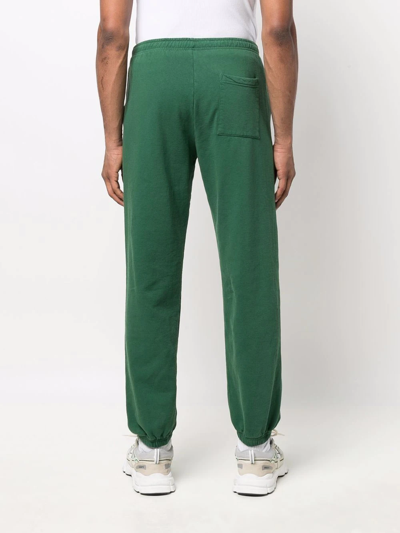 Shop Sporty And Rich Prince Print Track Trousers In Green