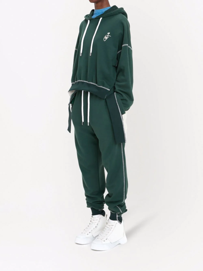 Shop Jw Anderson Tapered-leg Track Pants In Green