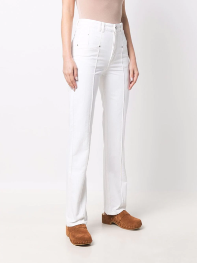 Shop Isabel Marant Seam Detailed Bootcut Jeans In White