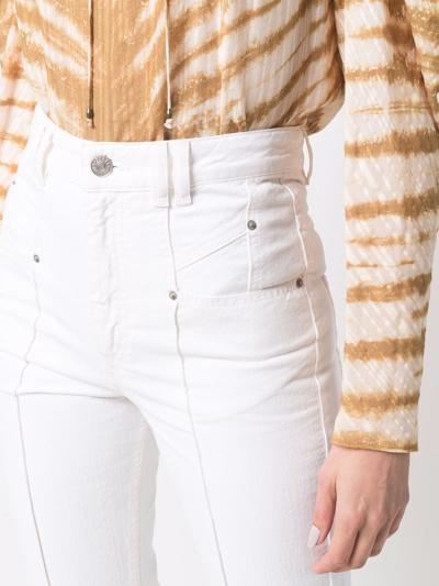 Shop Isabel Marant Seam Detailed Bootcut Jeans In White