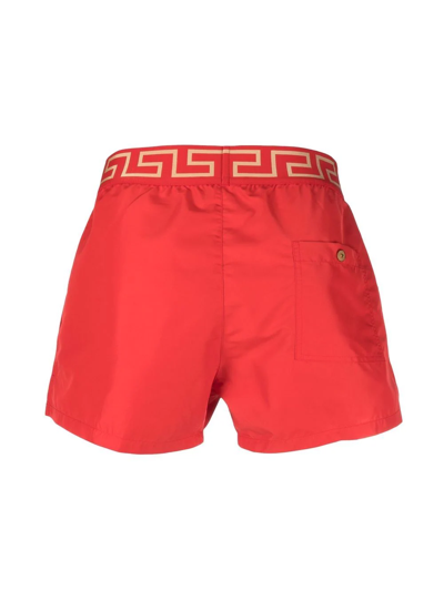 Shop Versace Greca Border Swim Shorts In Red