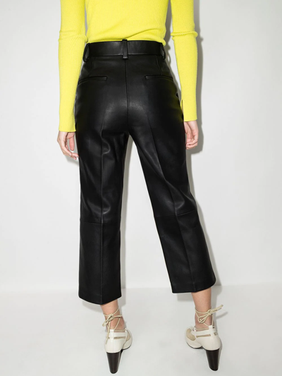 Shop Khaite Melie Cropped Leather Trousers In Black