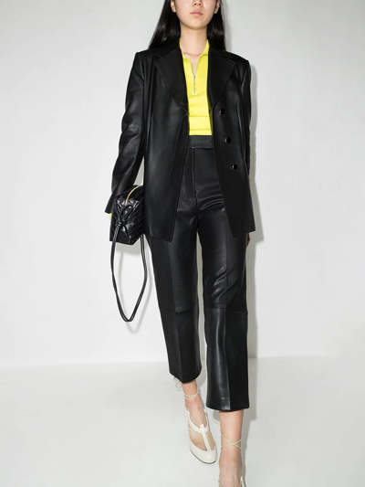 Shop Khaite Melie Cropped Leather Trousers In Black