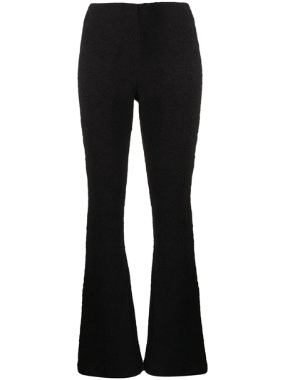 Shop Msgm Textured Flared Trousers In Black