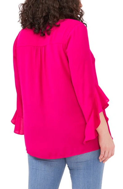 Shop Vince Camuto Flutter Sleeve Crossover Georgette Tunic Top In Fuchsia Rose