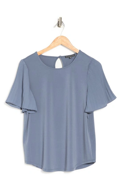 Shop Adrianna Papell Pleated Woven Short Sleeve Top In Dusty Blue