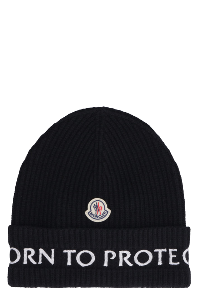 Shop Moncler Born To Protect - Ribbed Knit Beanie In Black