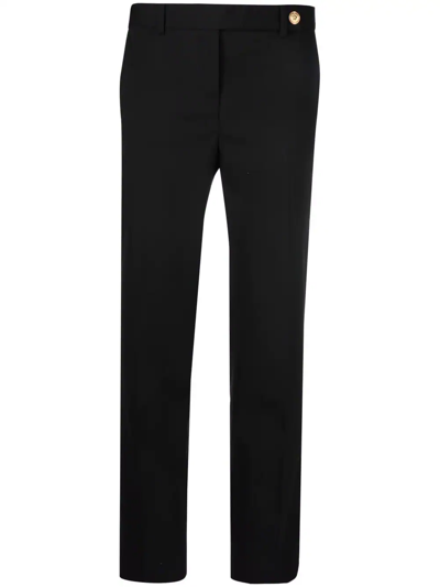 Shop Versace Medusa-fastened Tailored Trousers In Black