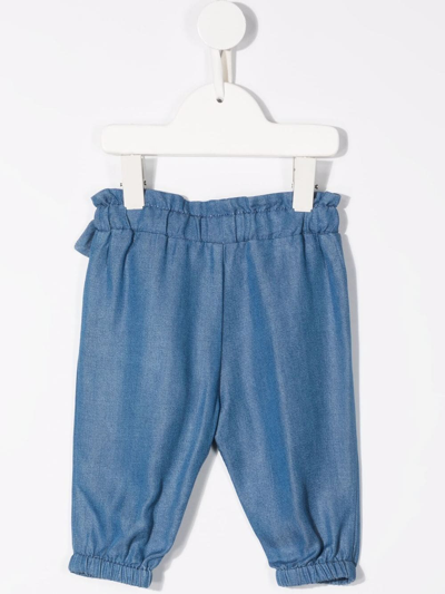 Shop Moschino Teddy Bear-print Tencel™ Trousers In Blue