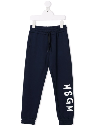 Shop Msgm Logo-print Tapered Track Pants In Blue