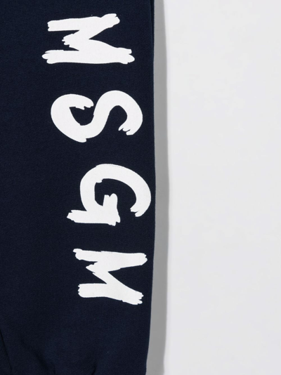 Shop Msgm Logo-print Tapered Track Pants In Blue