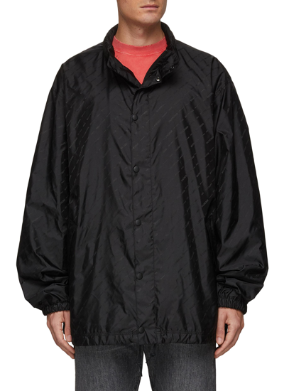 Shop Balenciaga Snap Button Front Hidden Hood Allover Logo Rain Jacket In Black