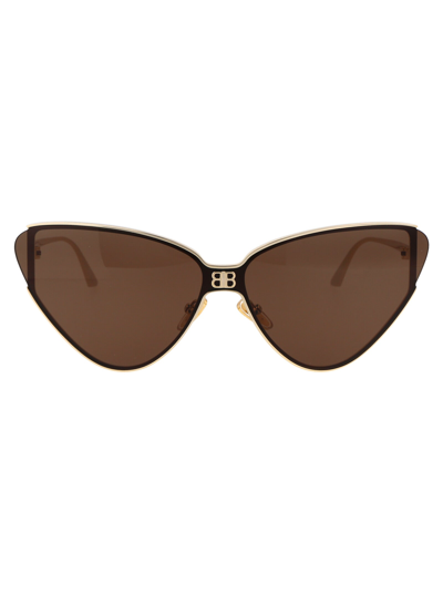 Shop Balenciaga Sunglasses In 002 Gold Gold Brown