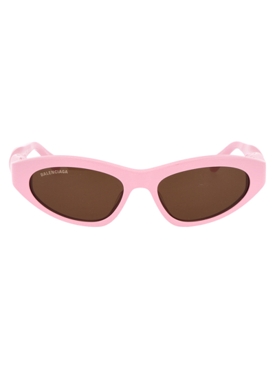 Shop Balenciaga Sunglasses In 004 Pink Pink Brown