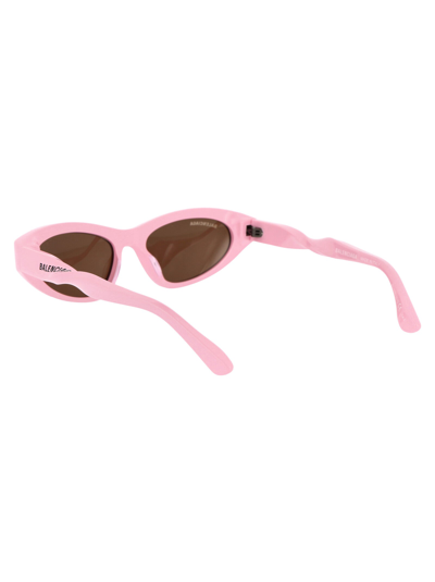 Shop Balenciaga Sunglasses In 004 Pink Pink Brown