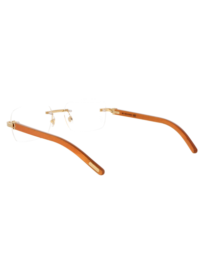 Shop Cartier Optical In 006 Gold Orange Transparent