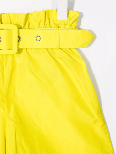 Shop Msgm Belted Wide-leg Shorts In Yellow