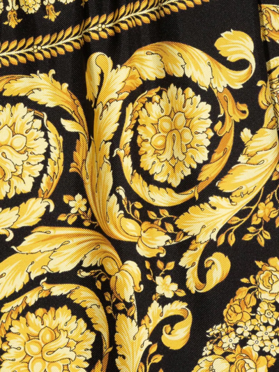 Shop Versace Baroque-pattern Print Trousers In Yellow