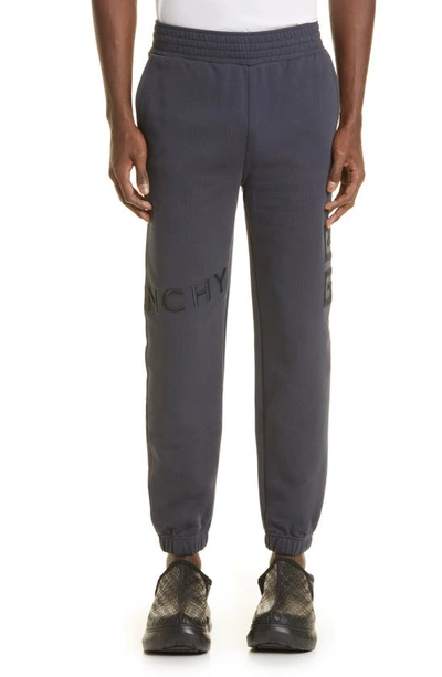 Shop Givenchy 4g Embroidered Slim Fit Cotton Joggers In 403-night Blue