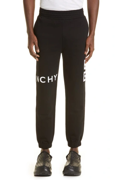Shop Givenchy 4g Embroidered Slim Fit Cotton Joggers In Black
