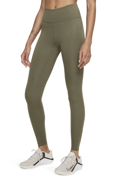 Shop Nike One Luxe Tights In Medium Olive/ Clear