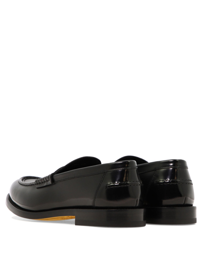 Shop Doucal's "penny" Loafers In Black  