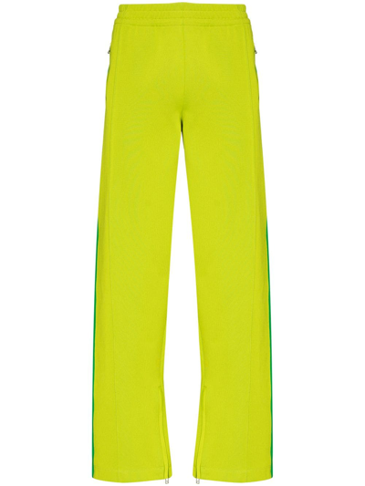 Lime green on sale stripe track pants